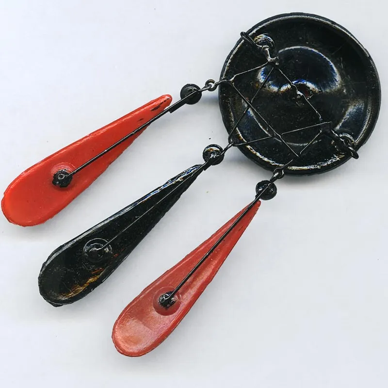 Art Deco red & black glass pendants with black enamel wire. 35mmx90mm Sold individually. b11-mi-0142
